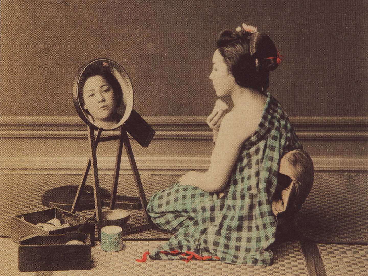 Mädchen mit einem Spiegel