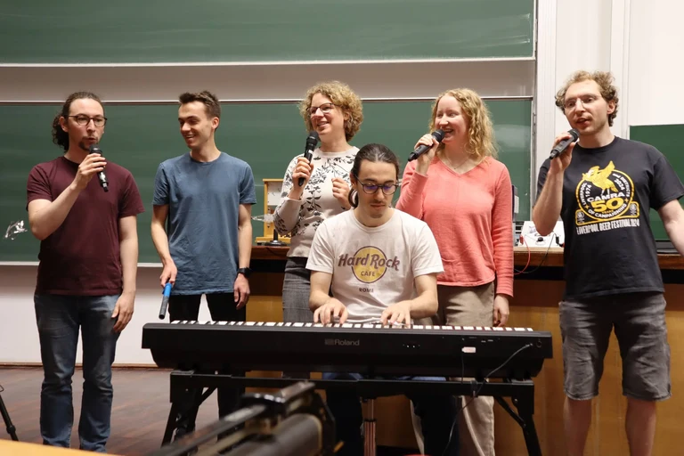 Scenes from rehearsals: When the Phyusical team gets together, they sing.