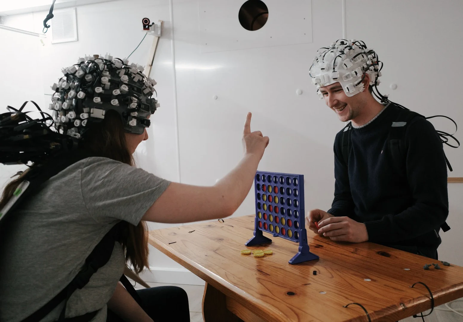 The photo shows two test subjects in a study