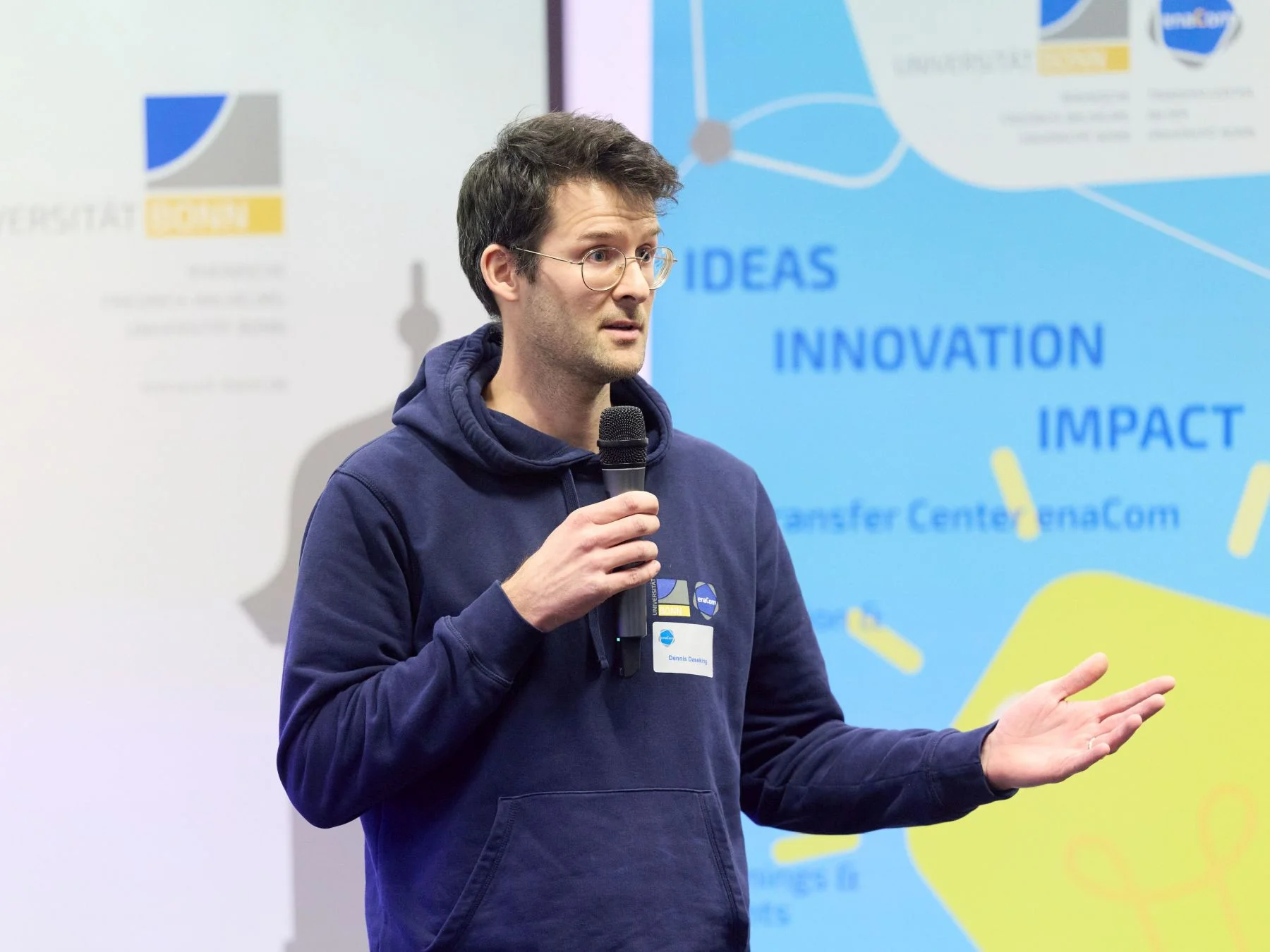 Dennis Daseking gives a welcoming speech at the start