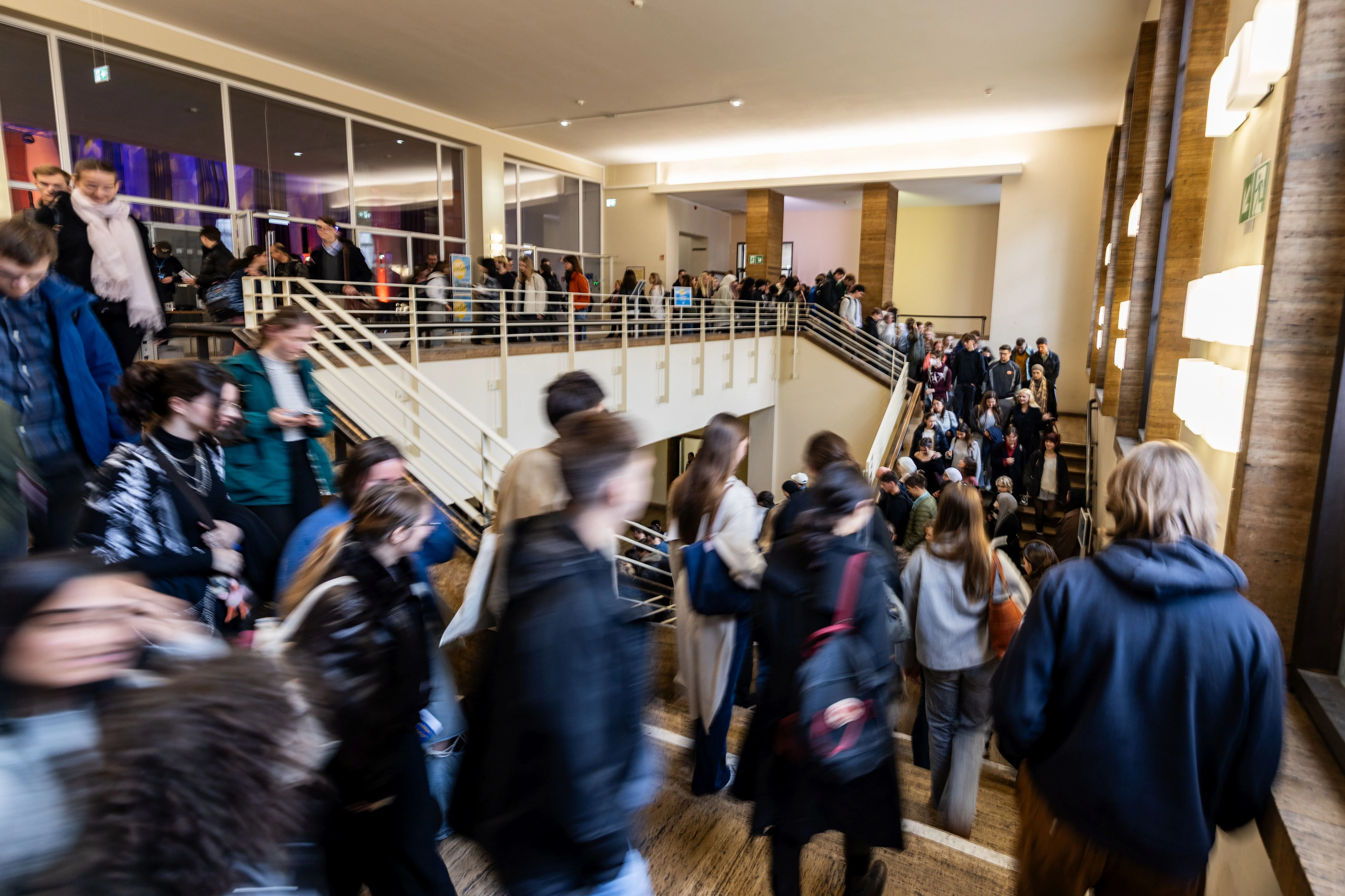 Due to the high level of interest, the event was broadcast from the auditorium to adjacent lecture halls, on a video wall in the arcade courtyard, and via live stream.