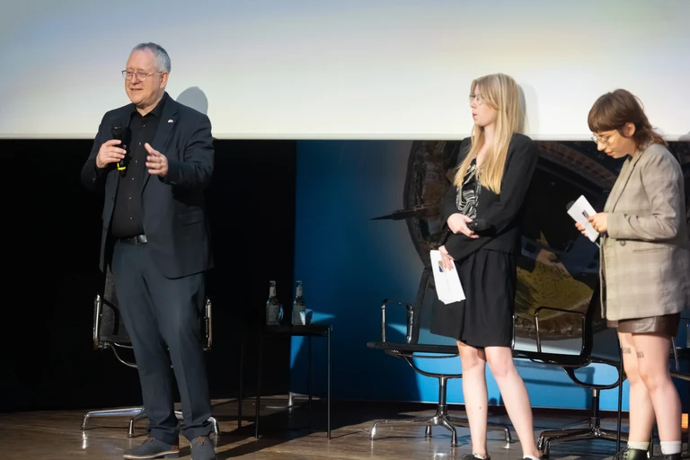 Prof. Dr. Dr. h.c. Michael Hoch, the Rector of the University of Bonn, announced the next event.