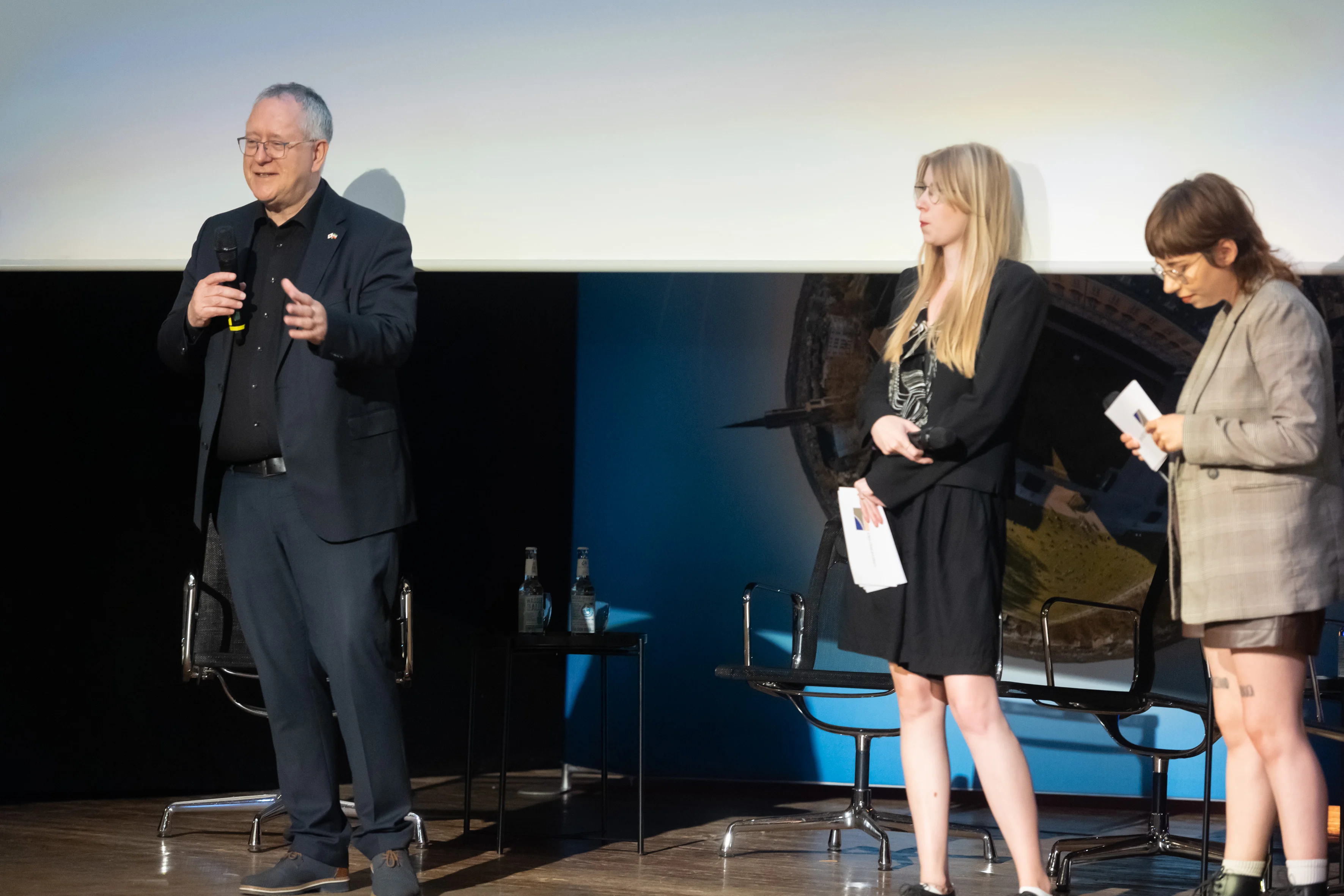 Prof. Dr. Dr. h.c. Michael Hoch, the Rector of the University of Bonn, announced the next event.