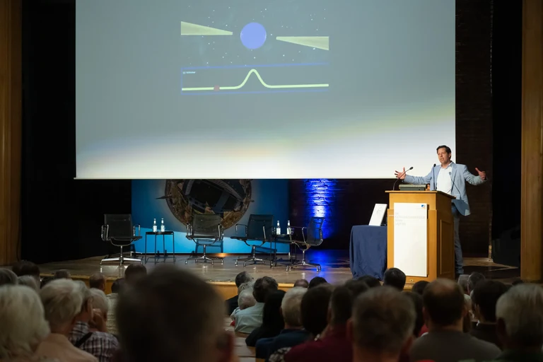 He used an animation to illustrate the rotation and radiation of a star.