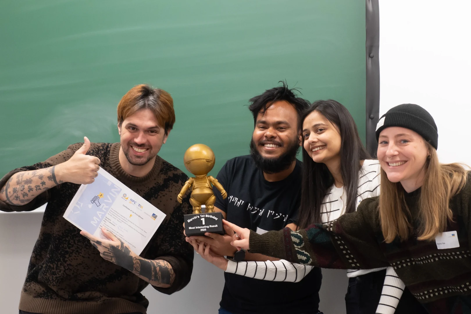 Celebrating their first-place win in the Marvin competition (from left): Dr. Nicolas Kluge Correa, Aniket Sen, Shiza Fatimah and Sophia Falk, who entered with “Tucano: Advancing Neural Text Generation for Portuguese”. Photo: Barbara Frommann / Uni Bonn